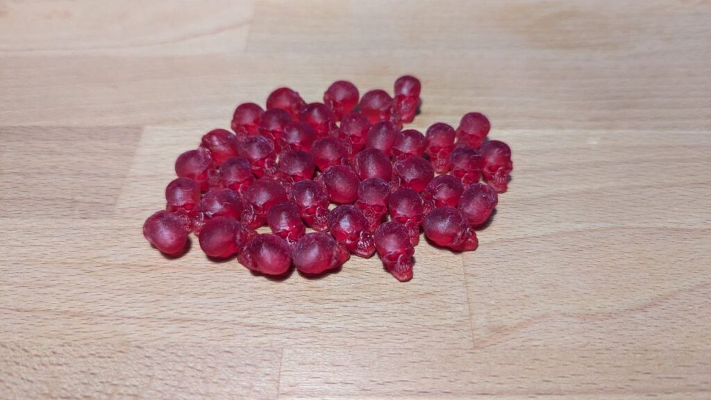 Pool token a forma di teschio per VtES stampati in 3D